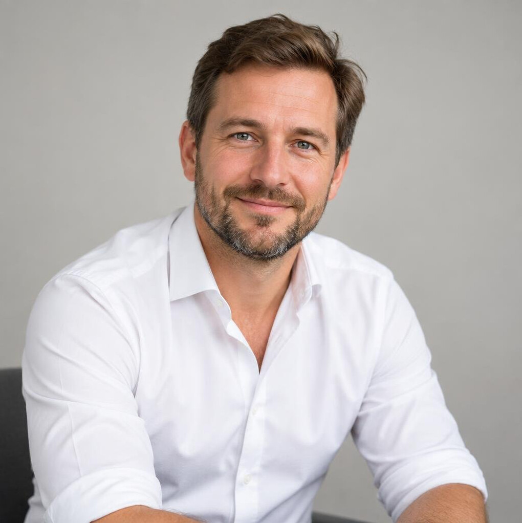 Portrait of a bearded man in a shirt, dispute resolution advisor
